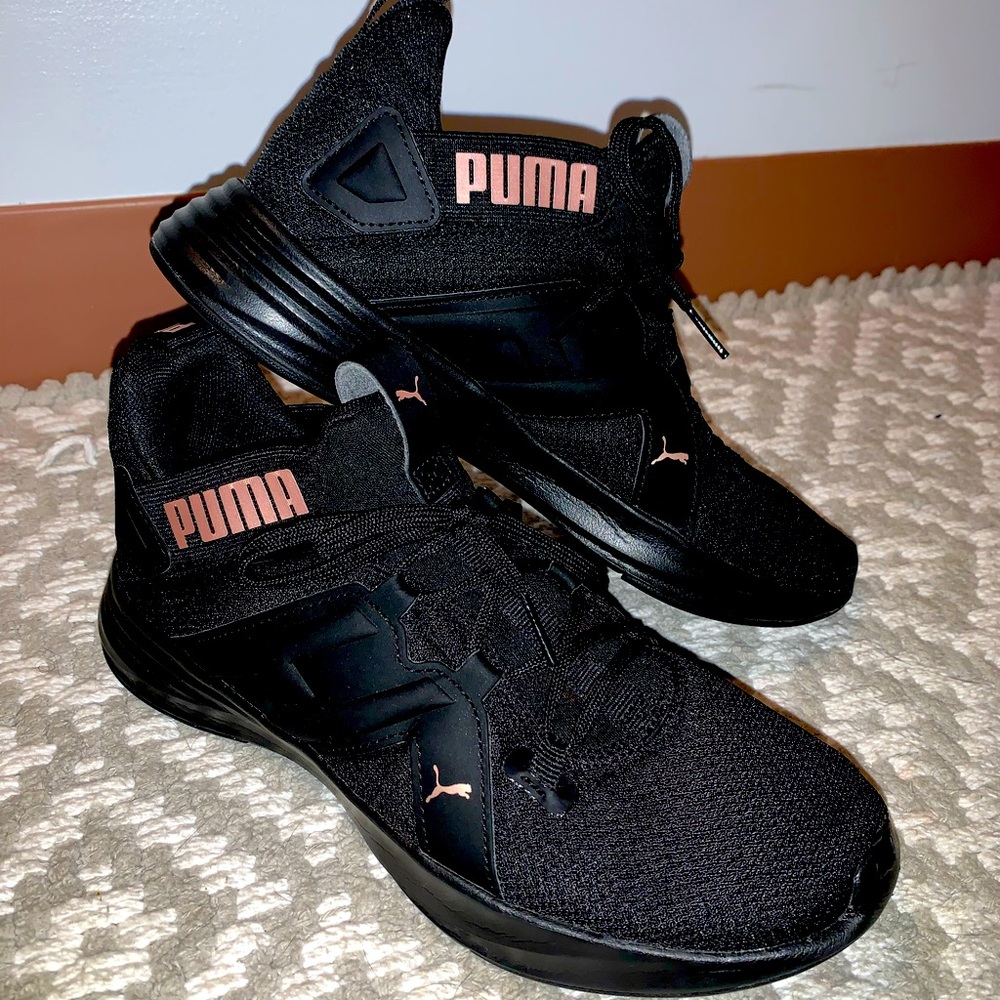 Women’s Puma sneakers, black and rose gold accent. Worn only a couple times!!